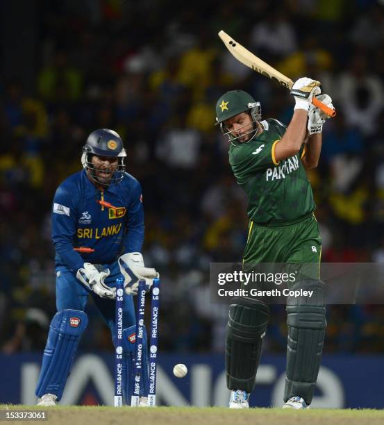 Sri Lanka wicketkeeper Kumar Sangakkara celebrates after Shahid Afridi of Pakistan is bowled by Rangana Herath during the ICC World Twenty20 2012...