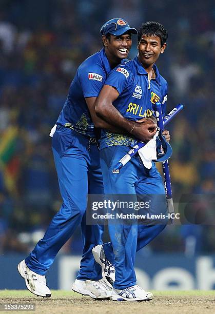 Angelo Mathews and Nuwan Kulasekara of Sri Lanka celebrate their teams win after the ICC World Twenty20 2012 Semi Final match between Sri Lanka and...