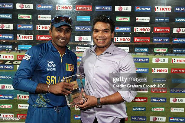Mahela Jayawardene of Sri Lanka, man of the match is seen with his award after Sri Lanka defeated Pakistan in the ICC World T20 Semi Final between...