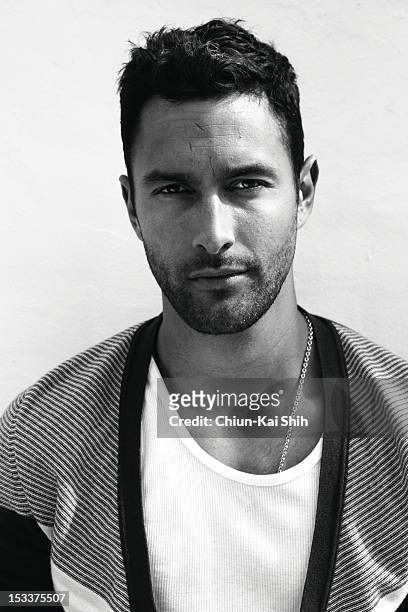 Model/actor Noah Mills poses for August Man on March 24, 2012 in New York City.