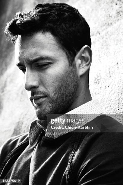 Model/actor Noah Mills poses for August Man on March 24, 2012 in New York City.