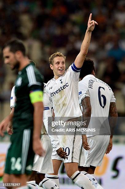 Tottenham's Michael Dawson celebrates after scoring against Panathinaikos during the group stage Europa League football game between Panathinaikos...
