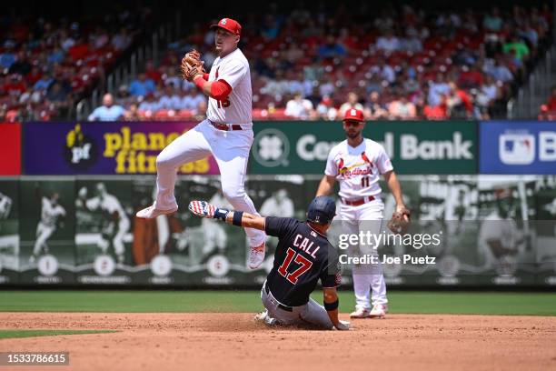 Alex Call of the Washington Nationals is out at second base as Nolan Gorman of the St. Louis Cardinals attempts to turn a double play in the fifth...