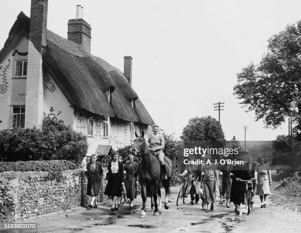Year old Diana Holland rides a horse ahead of the volunteer Women's Observers from the village of Benhall as they go out on patrol to watch for...