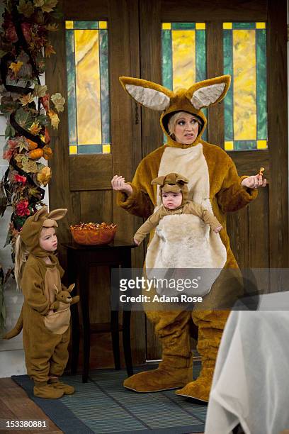 Le Halloween" - Amy dresses up like a kangaroo for Halloween, complete with a baby pouch for Toby and Charlie, while Bob goes in his exterminator...