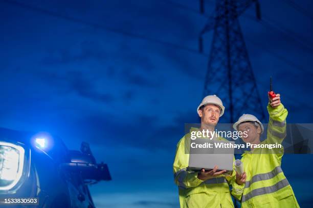 engineers workers at electricity station - pole drawing stock pictures, royalty-free photos & images