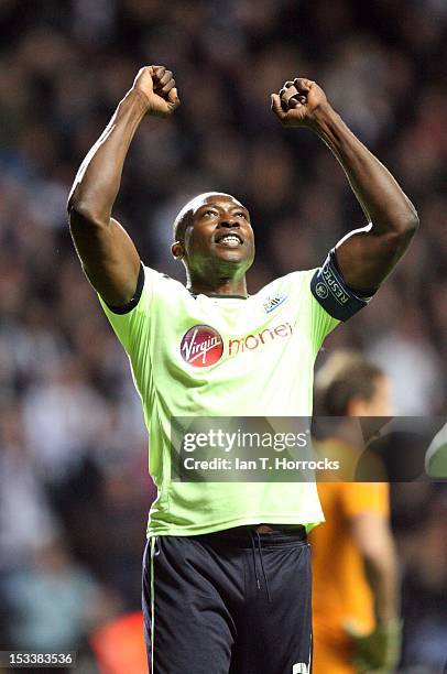 Shola Ameobi of Newcastle United celebrates scoring the opening goal during the UEFA Europa League group stage match between Newcastle United and...