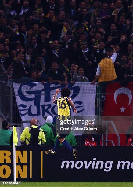 Cristian of Fenerbahce celebrates his team's first goal during the UEFA Europa League group C match between Borussia Moenchengladbach and Fenerbahce...