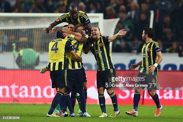 Raul Mereiles of Fenerbahce celebrates his team's second goal with team mates during the UEFA Europa League group C match between Borussia...