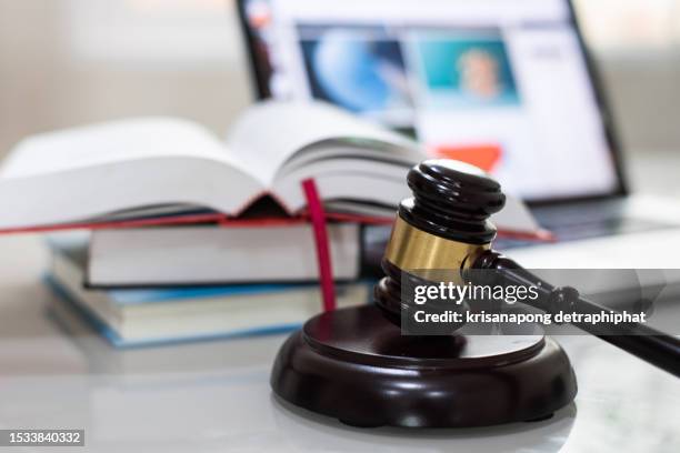 book with hammer,education concept - law book stock pictures, royalty-free photos & images