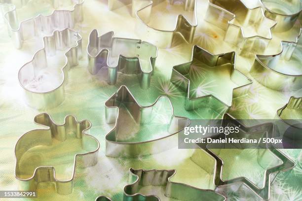 high angle view of christmas decoration on table - cookie cutter stock pictures, royalty-free photos & images