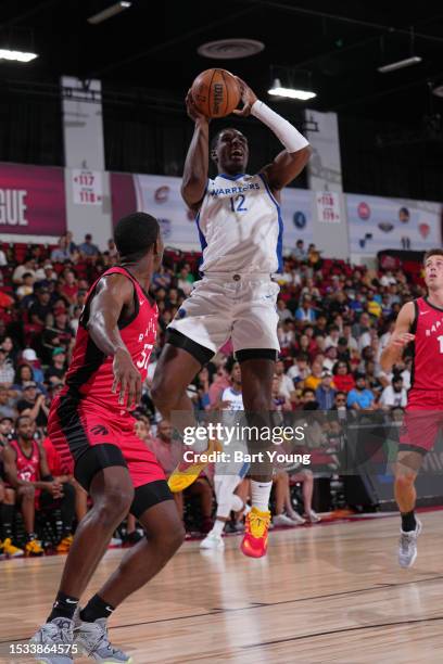 Reggie Perry of the Golden State Warriors drives to the basket during the game against the Toronto Raptors during the 2023 NBA Las Vegas Summer...