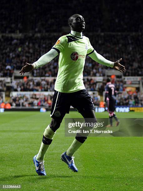 Papiss Cisse of Newcastle United celebrates after scoring the third goal during the UEFA Europa League group stage match between Newcastle United and...
