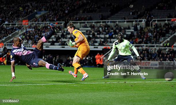 Henrique of Bordeaux scores an own goal during the UEFA Europa League group stage match between Newcastle United and Girondins de Bordeaux at The...