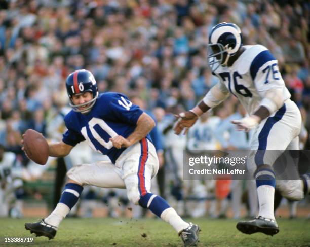 New York Giants QB Fran Tarkenton in action, under pressure from Los Angeles Rams at Los Angeles Memorial Coliseum. Los Angeles, CA CREDIT: Neil...