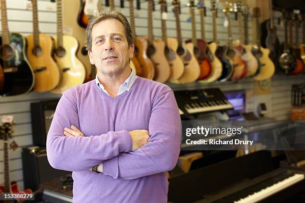 Singer Owner Owner Of Music Shop In His Store High-Res Stock Photo - Getty Images