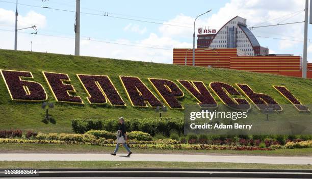 Pedestrian walks past a flower arrangement reading "Belarus" on July 09, 2023 in Minsk, Belarus. After breaking away from the remnants of the Soviet...