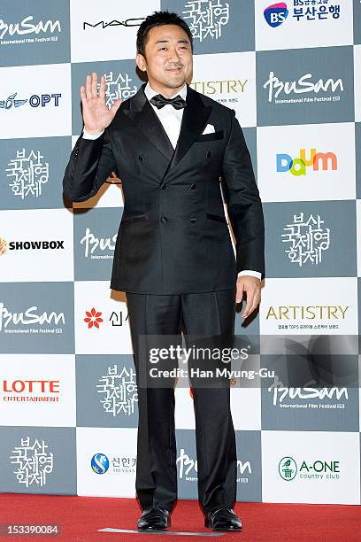 South Korean actor Ma Dong-Seok arrives for the opening ceremony of the 17th Busan International Film Festival at the Busan Cinema Center on October...