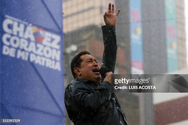 Venezuelan President Hugo Chavez gestures as he delivers a speeech during his campaign closing rally for his reelection in Caracas, Venezuela on...