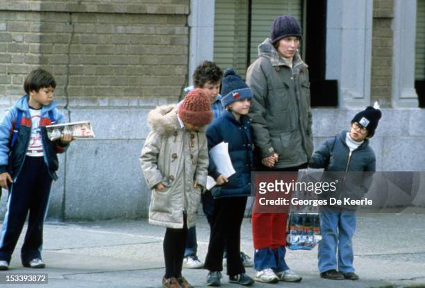 Mia Farrow with children in New York, 1981.