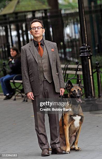 Michael Emerson with Boker the dog who plays "Bear" filming on location for "Person Of Interest" on October 4, 2012 in New York City.