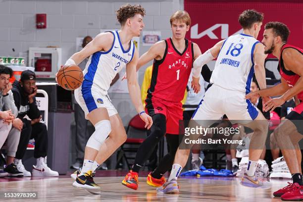 Brandin Podziemski of the Golden State Warriors dribbles the ball during the game against the Toronto Raptors during the 2023 NBA Las Vegas Summer...