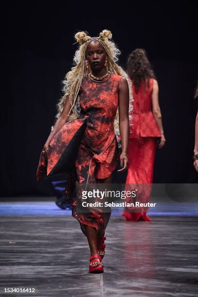 Model walks the runway during the Rebekka Ruetz Runway Show as part of the W.E4. Fashion Day at Verti Music Hall on July 11, 2023 in Berlin, Germany.