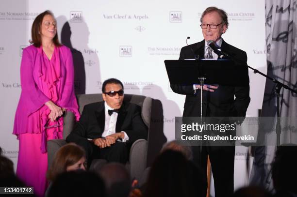Lonnie Ali, Muhammad Ali and Dick Cavett pose onstage during the Norman Mailer Center 4th Annual Benefit Gala on October 4, 2012 in New York City.
