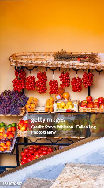 open air fruit and vegetable stand along a stairway in the charming seaside italian town of positano on the spectacular amalfi coast - amalfi stock pictures, royalty-free photos & images