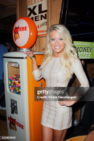 Hillary Cook Hooters 2013 Calendar girl Miss July Hillary Cook attends the... News ...