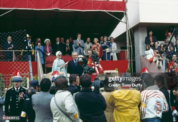 Austrian racing driver Niki Lauda wins the Monaco Grand Prix in his Ferrari, 11th May 1975. Prince Rainier III of Monaco and Princess Grace are there...