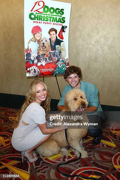 Danielle Chuchran and James Gaisford at "12 Dogs of Christmas: Great Puppy Rescue" Los Angeles Preview held at AMC Century City 15 theater on October...