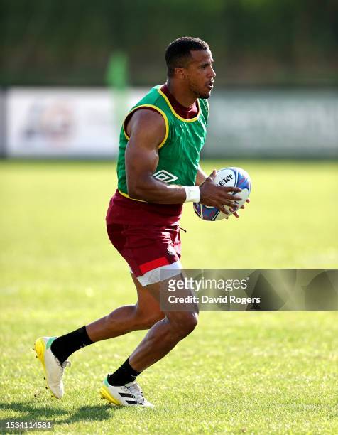 Anthony Watson runs with the ball during the England training session held at the Payanini Center on July 11, 2023 in Verona, Italy.