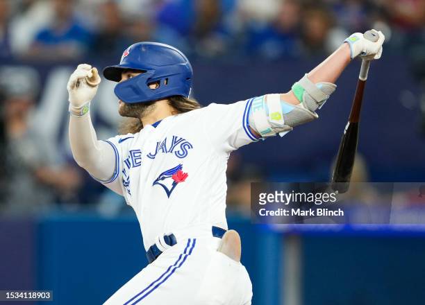 Bo Bichette of the Toronto Blue Jays hits a home run against the Arizona Diamondbacks during the eighth inning in their MLB game at the Rogers Centre...