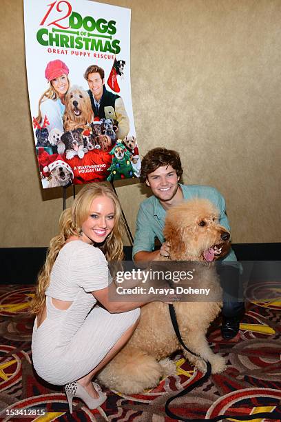 Danielle Chuchran and James Gaisford arrive for the sneak preview of '12 Dogs Of Christmas: Great Puppy Rescue' at AMC Century City 15 theater on...
