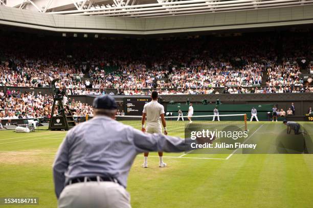 Line judge calls out during the Men's Singles Quarter Final match between Novak Djokovic of Serbia and Andrey Rublev during day nine of The...