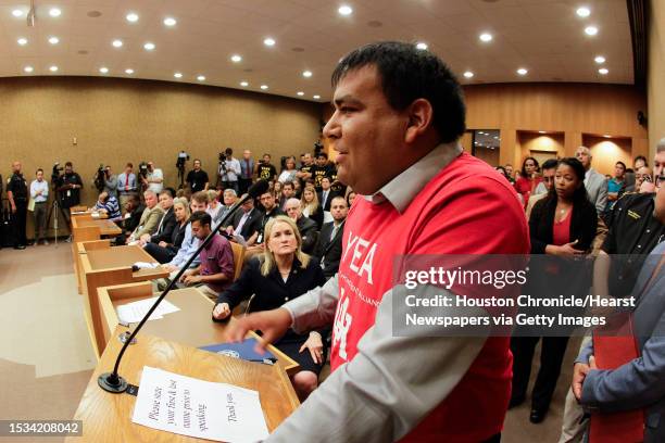 Daniel Candelaria tells the Harris County Commissioners Court that they will be held accountable for their actions as he and others protested against...