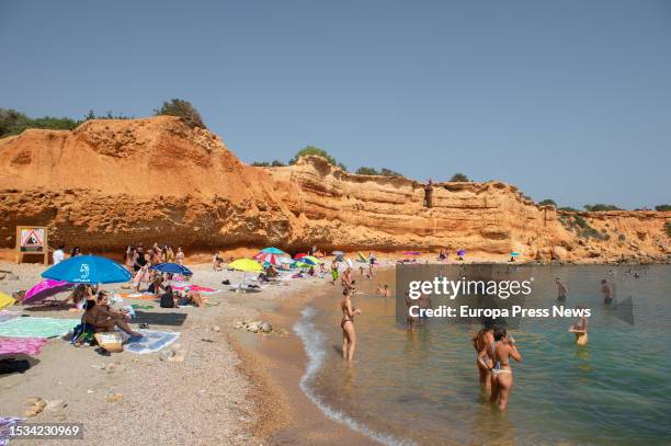 Several people on the beach of Es Bol Nou, on 11 July, 2023 in Ibiza, Balearic Islands, Spain. Data from the Hotel Business Federation of the...