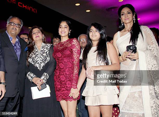 Actress Sridevi with her daughters Jhanvi Kapoor, Khushi Kapoor and husband Boney Kapoor during the premiere of the movie 'English Vinglish' held at...