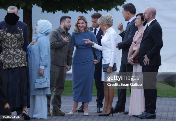 Ukrainian President Volodomyr Zelensky , his wife Olena Zelenska and French First Lady Brigitte Macron share a laugh as French President Emmanuel...