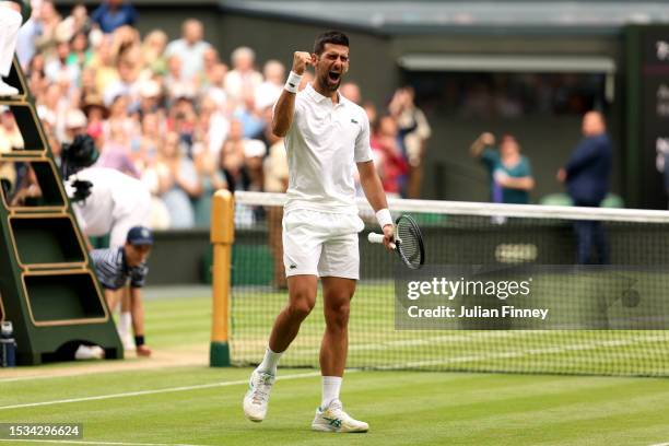 Novak Djokovic of Serbia celebrates victory against Andrey Rublev in the Men's Singles Quarter Final match during day nine of The Championships...