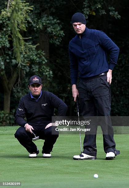 Craig Shave of Whetstone GC and partner Matthew Cort of Rothley Park GC looks on during the final round of the Skins PGA Fourball Championship at...