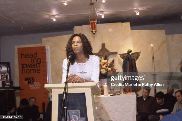 An unidentified person speaks during a funeral service at the MCC Church , New York, New York, February 26, 2002.