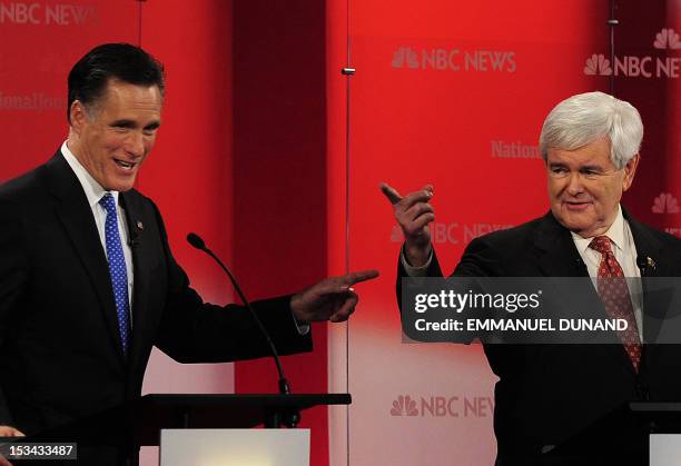 Republican presidential hopefuls Mitt Romney and Newt Gingrich take part in The Republican Presidential Debate at the University of South Florida in...