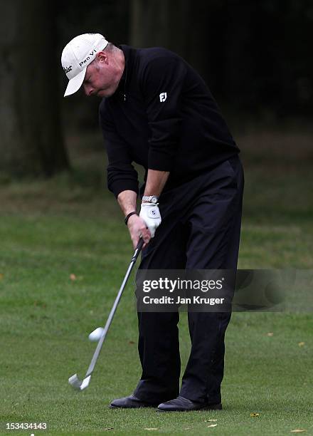 Adrian Ambler of Low Laithes GC plays his approach shot on the 18th during the final round of the Skins PGA Fourball Championship at Forest Pines...