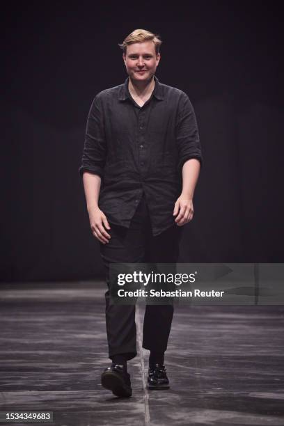 Designer Danny Reincke is seen on the runway during the Danny Reincke Runway Show as part of the W.E4. Fashion Day at Verti Music Hall on July 11,...