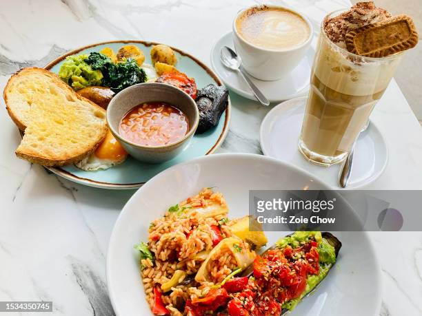freshly prepared hearty breakfasts with latte in cafe - creme eggs stock pictures, royalty-free photos & images