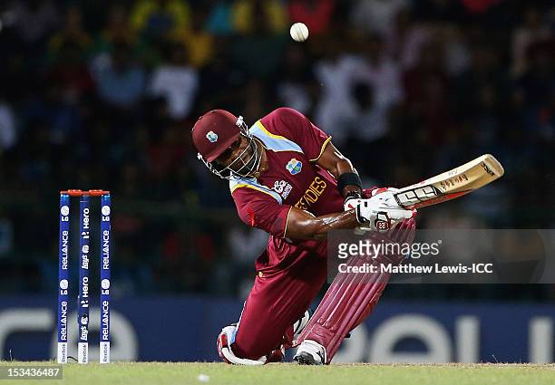 Kieron Pollard of the West Indies hits a four during the ICC World Twenty20 2012 Semi Final match between Australia and West Indies at R. Premadasa...