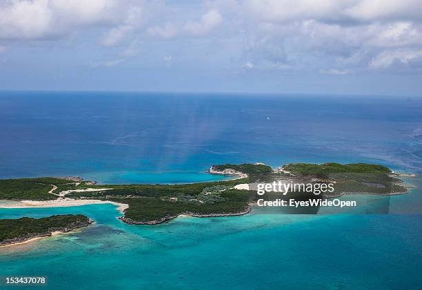 Aerial view of the small atolls, lagoon islands and islands of the Exumas seen from an airplane on June 15, 2012 in The Bahamas.