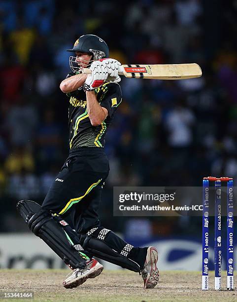 George Bailey of Australia hits the ball towards the boundary during the ICC World Twenty20 2012 Semi Final match between Australia and West Indies...